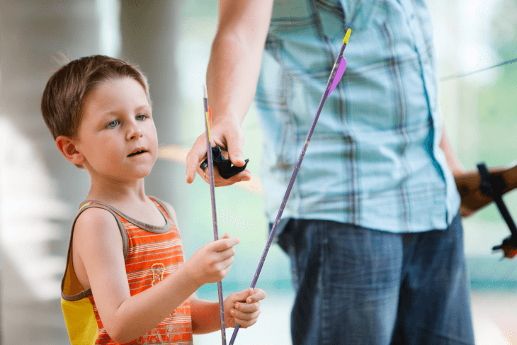 Kid at Archery Practice Kid at Archery Practice