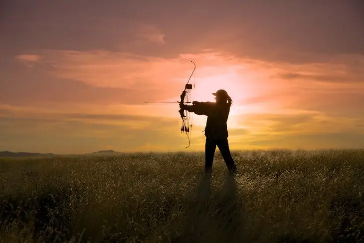 archery practice at sunrise